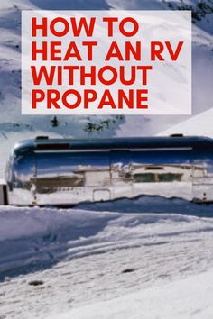 the words how to heat an rv without propane are in front of a snowy mountain