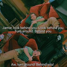 two people laying on red couches in a living room with the caption'annie, look behind you, look behind you, turn around behind you '