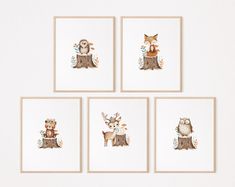 four framed pictures with animals on them in the shape of an owl, fox, deer and tree stump