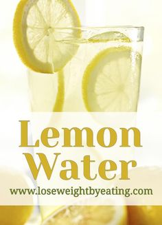 lemon water in a glass with sliced lemons