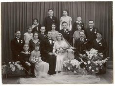 an old black and white photo of a wedding party