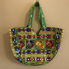 Beautiful Unique Large Eclectic Bag From Mexico. Handmade With Beads, Mirrors, Sequins And Knits. Strap Has Handmade Knits. The Whole Bag Has A Zipper That Can Enclose. Measures 19" Wide X 14" Long. One-Of-A-Kind Bag, Made Local From Mexico. Never Used. Green Beaded Bag For Summer, Summer Green Beaded Bag, Green Beaded Shoulder Bag For Daily Use, Green Beaded Shoulder Bag For Beach, Green Beaded Shoulder Bag For The Beach, Bohemian Green Beaded Bag, Traditional Green Beaded Bag, Traditional Green Beaded Bags, Green Shoulder Bag For Summer Festival