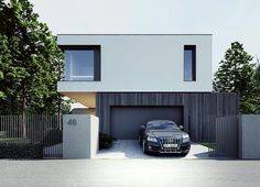 a car is parked in front of a house