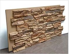 an image of a wall made out of bricks and stone veneers on the floor