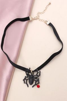 How fun is this spider for Halloween velvet choker necklace. This will be perfect on your Halloween costume.matching earring: 10E3060167DIMENSIONlength: 12"ext: 3" Ball Chain Extclasp: Lobster Clawmetal finish: Gold Platedproduct: Lead & Nickel Compliantanti-tarnish: Double E-coating Punk Jewelry For Halloween Costume Party, Trendy Black Jewelry For Cosplay, Spooky Black Jewelry For Party, Trendy Metal Choker For Halloween, Black Spooky Jewelry For Party, Black Punk Jewelry For Costume Party, Black Choker For Halloween Gift, Black Novelty Jewelry For Party, Black Spooky Party Jewelry