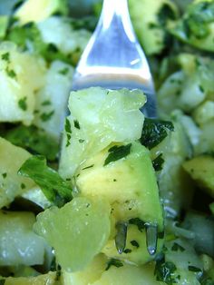 a close up of a spoon with food on it