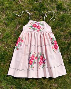 Sun dress is made of vintage tablecloth.  Please check measurements using a measuring tape, It fits from XXS to M!  Dress length - 39"  Flat measurements: Armhole pt top pt - 18"  Gathered seam pt to pt - 19"  Best fit: Bust - fits from 31" to 37"  Waist - fits up to 34" max  Dress hem is 72"  Shoulder straps are tie-able. Dress is unlined, fabric is heavy. Color is beige, fabric content is cotton.  Dress can also be styled as halter dress by tying the straps around neck! Dress is trans-seasonal Handmade Pink Dress For Spring, Handmade Pink Dresses For Spring, Vintage Cotton Dress For Brunch, Dress Made From Tablecloth, Spring Vintage Dress With Lace Patchwork, Upcycle Vintage Tablecloths, Upcycled Tablecloth Dress, Pink Vintage Dress With Floral Embroidery, Cottagecore Cotton Dress With Lace Patchwork