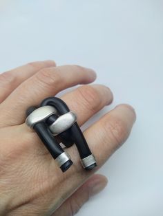 Rubber Statement Ring. Unusual Modern Ring. Avant-garde Jewelry. Oversize Funky Finger Ring Awesome unusual ring, made of rubber and silver-plated metal. It is very easy to adjust with the two ends of the rubber. Rejoice yourself or a loved one with this unusual, different gift. I design and make each piece myself. The package will be sent as soon as possible (2-5 days) after purchase. Feel free to contact me if you have any questions about my products. Thank you for visiting my store and don't Funky Fingers, Avant Garde Jewelry, Finger Jewelry, Unusual Rings, About Me Questions, Wide Ring, Wide Rings, Modern Ring, Ring Finger