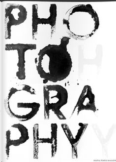 black and white photograph of the words pho to gray written in spray paint on paper