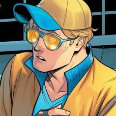 an image of a man wearing sunglasses and a yellow jacket with his hand on his hip