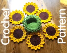 there are crocheted sunflowers arranged on the table with text overlay