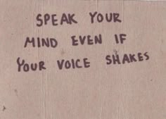 a message written on a piece of cardboard that says speak your mind even if your voice shakes