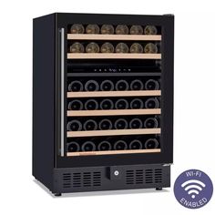 the wine cooler has many bottles in it