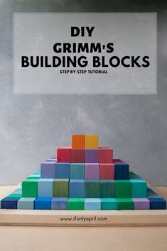 a wooden block tower with the words diy gumm's building blocks on it