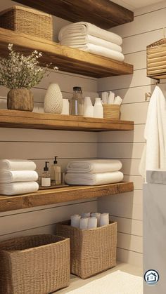 a bathroom with open shelving and towels on the shelves