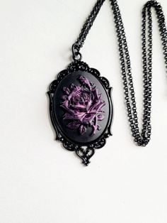 JUST LISTED Purple Iridescent Rose Gothic Rockabilly Cameo Black Necklace Pendant Victorian Jewelry Hand painted cameo If you are wanting a specific color of roses please feel free to contact me and I will do my best to create what you are searching for. Victorian Jewelry substantial in size at just a little over 2 INCHES Long Center is 40mmx30mm **MATCHING ITEMS IN OUR STORE BADGE HOLDER BROOCH HAIR PINS - CLIPS** **thank you for taking the time to look at our items. Each item is handcrafted an Color Of Roses, Gothic Rockabilly, Random Jewelry, Gothic Clothes, Purple Necklace, Jewelry Hand, Magic Art, Black Necklace, Victorian Jewelry