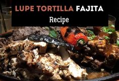 a plate full of food with the words lupe tortilla fajita