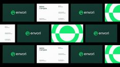 several business cards with green and white logos on them, all in different shapes and sizes