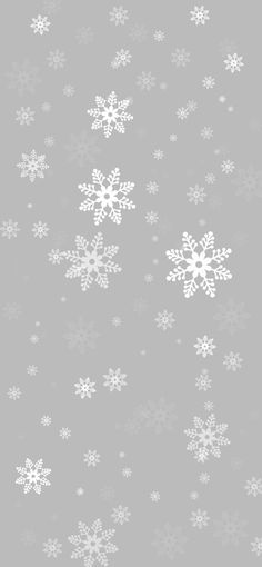 white snowflakes on a gray background