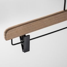 a close up of a shelf with a coat rack on it