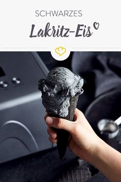 a person holding up a rock with the words lakrite - fis on it