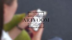 a blurry image of a woman holding a cell phone to her ear with the word art vom on it