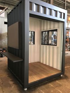 a shipping container that is made to look like it has been built into the ground