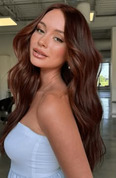 Discover 27 stunning chocolate auburn hair ideas to elevate your look. From rich hues to chic highlights, find your perfect shade. #red #hairstyles Fall Auburn Hair Balayage Dark Brown, Auburn Hair Color On Olive Skin, Cinnamon Brown With Blonde Highlights, Brunette Going Red, Fall Hair Color For Brunettes Auburn, Chocolate Brown Hair With Hint Of Red, Cowgirl Copper Brown Hair, Auburn Hair With Face Framing Highlights, Dark Auburn Hair Natural