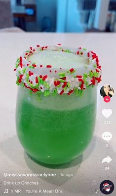 a green drink with sprinkles on the rim