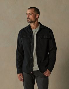 Crisp and structured. This shirt jacket is constructed from 100% Cotton canvas. It achieves an effortlessly rugged look with triple needle stitching for durability and a relaxed fit, great for layering. The jacket also includes two chest pockets with flaps, a shirt collar, a front button placket, a back yoke with a box pleat, elbow panels, sleeve cuffs with plackets, and a flattering shirttail hem. Black Overshirt Men Outfit, Black Shacket, Overshirt Women, Fall Color Trend, Rugged Look, Workwear Jacket, Mens Fashion Casual Outfits, Everyday Dresses, Short Shirts