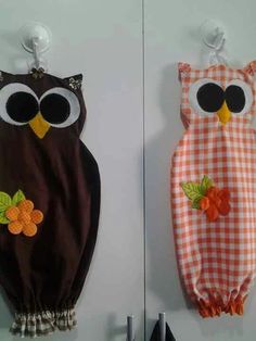 two wall hangings decorated with owls and gingham