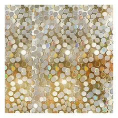 an abstract photograph with circles in gold and white