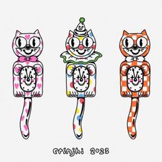 three colorful cats are standing in front of each other with their faces drawn on them