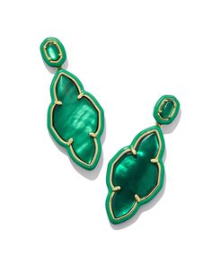 Our newest icon meets eye-catching enamel embellishments in the Abbie Gold Enamel Frame Statement Earrings in Emerald Illusion. With a hand-painted enamel frame that color coordinates with the stone, this statement style really pops. A spirited and stylish way to sport your team’s colors, we have a feeling you’ll be running back this pair all season long (and beyond!). Metal 14k Yellow Gold Over Brass Material Emerald Illusion, Green Enamel Closure Ear Post Size 0.82"W X 1.99"LDue to the one-of- Statment Earrings, Gold Statement Earrings, Shoe Gifts, Gold Enamel, Accessories Jewelry Earrings, Earring Sale, Gold Drop Earrings, Kendra Scott, Cuff Earrings