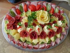 a platter filled with lots of different types of food