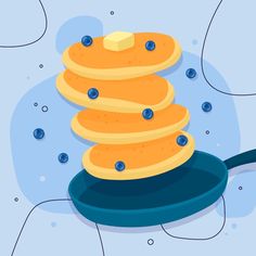 pancakes are stacked on top of each other in a frying pan with blue bubbles