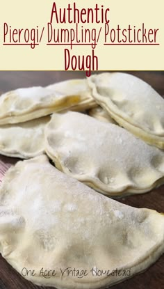 three pita breads sitting on top of a wooden table