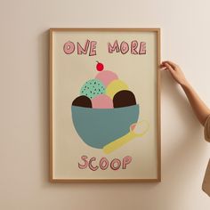 a woman holding up a poster with an ice cream sundae on it that says, one more scoop