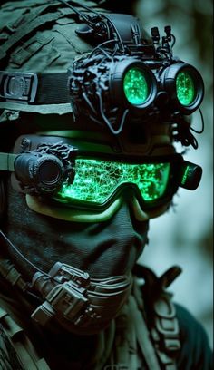 a man wearing goggles with green lights on his eyes and headgear is looking at the camera