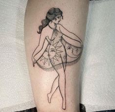 a woman in a dress is on her leg