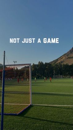 a soccer field with the words not just a game on it