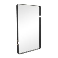 a mirror that is sitting on top of a white surface with black trimmings