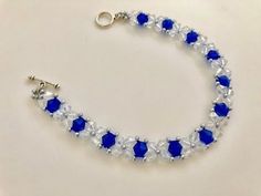 a blue and white bracelet with crystal beads