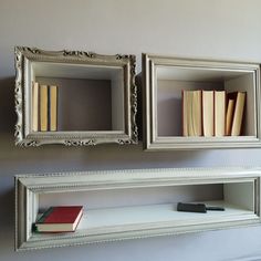 two framed bookshelves are next to each other