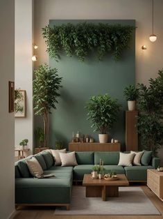 a living room filled with lots of green furniture and plants on the wall behind it