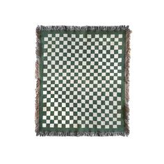 a green and white checkered tablecloth with fringes on it, against a white background