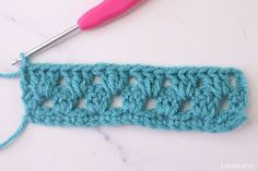 the crochet stitch is being worked on