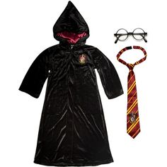 a harry potter robe, tie and glasses are on display in this image with it's hood pulled up