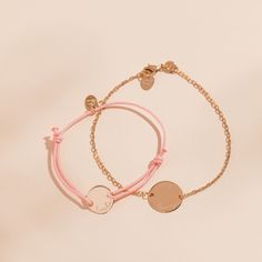 Create matching memories with our Personalized Mother and Child Bracelet Set. Featuring a chain bracelet for you and a mini braid bracelet for her, hand-engrave your special names and dates onto both sides of a delicate pastille charm.18K Champagne Gold Plated, 925 Sterling SilverMother Bracelet: 7, adjustable to 6.3Pastille Charm: 06x0.6Child Bracelet: Braid made of a durable, colourfast polyesterFully adjustable sliding knot fasteningMini Pastille Charm: 0.4 x 04Engraved by hand in our Paris w Personalized Adjustable Chain Bracelet For Friendship, Adjustable Personalized Chain Bracelet For Friendship, Adjustable Yellow Gold Bracelets With Charms, Personalized Yellow Gold Charm Bracelet With Adjustable Fit, Personalized Yellow Gold Charm Bracelet Adjustable, Personalized Adjustable Yellow Gold Charm Bracelet, Dainty Personalized Charm Bracelets, Dainty Charms Bracelets For Personalized Gift, Dainty Bracelets With Charms For Personalized Gift