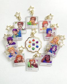 a bunch of anime key chains with pictures on them, all in different shapes and sizes